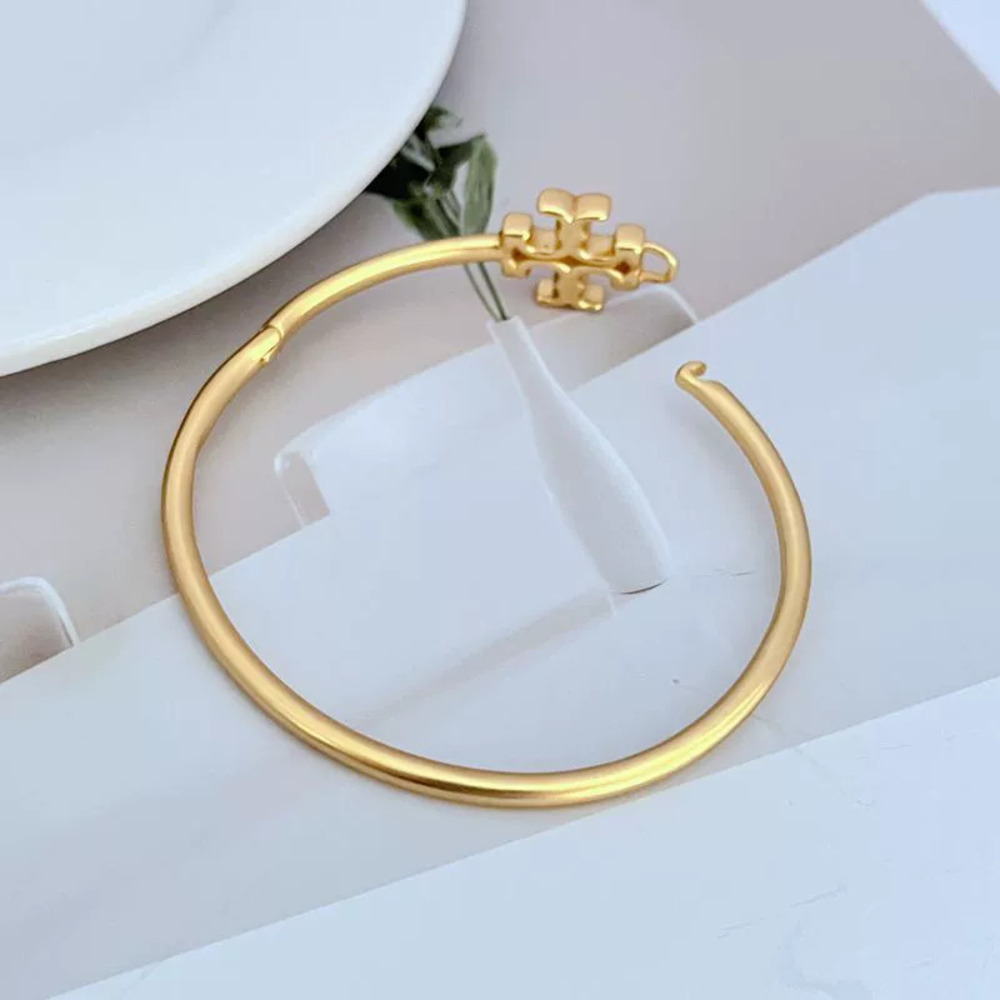 Tory Burch Matte Letter Metal Open Bangle - Picture 3 of 6